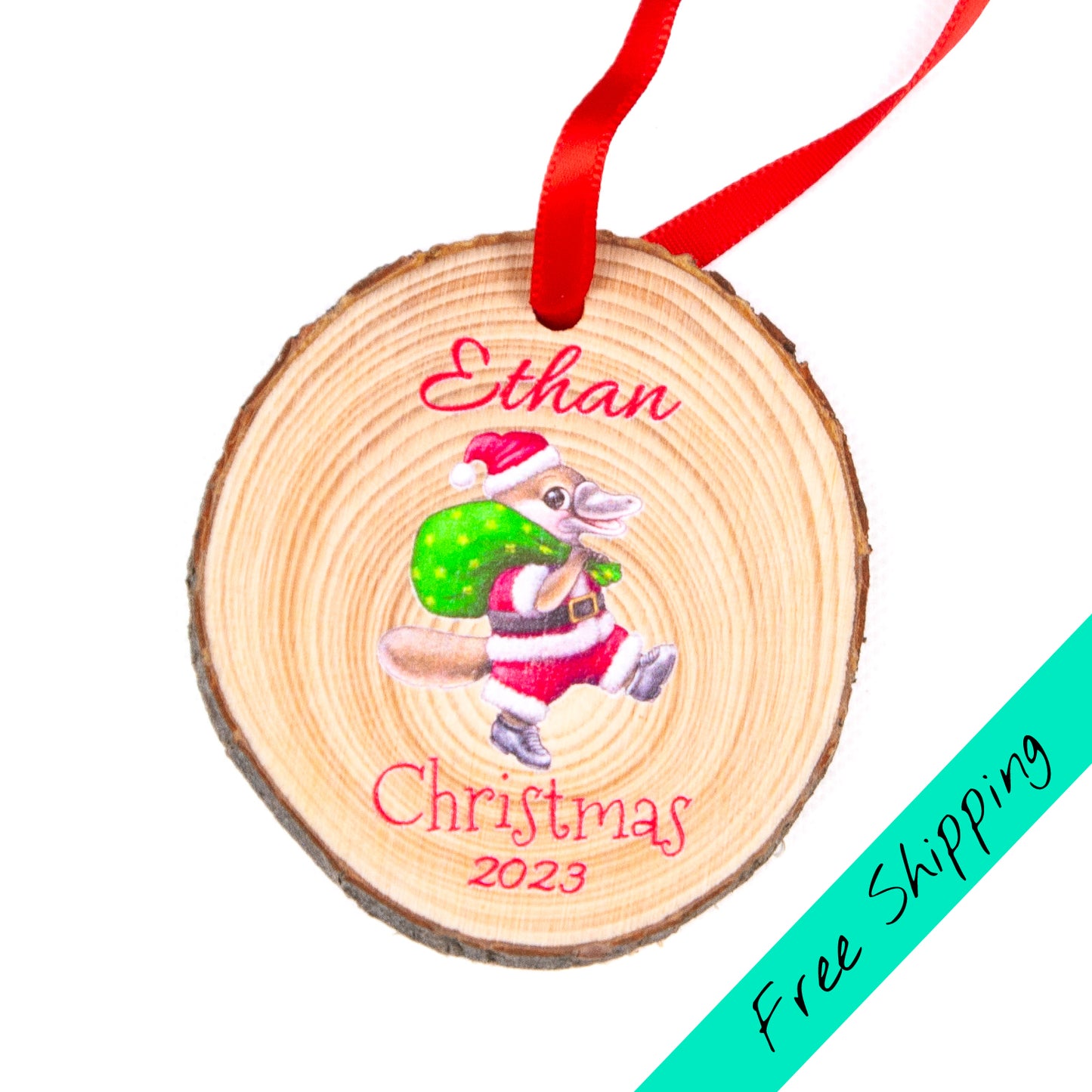 Platypus wood slice christmas ornament on white background